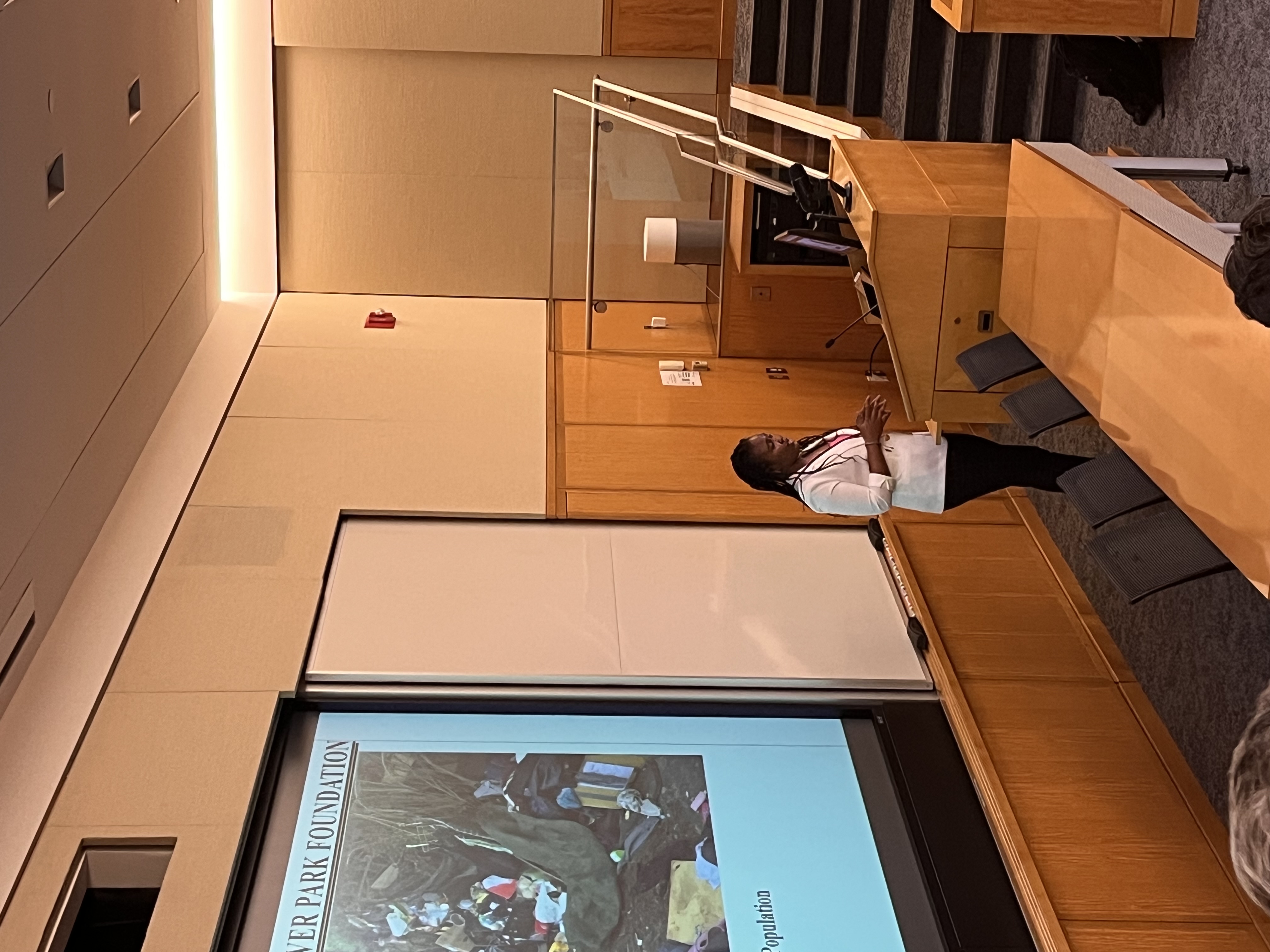 Presenting research findings at the Center for Geographic Analysis Conference, Harvard University.